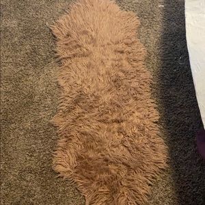 Furry blush pink rug
